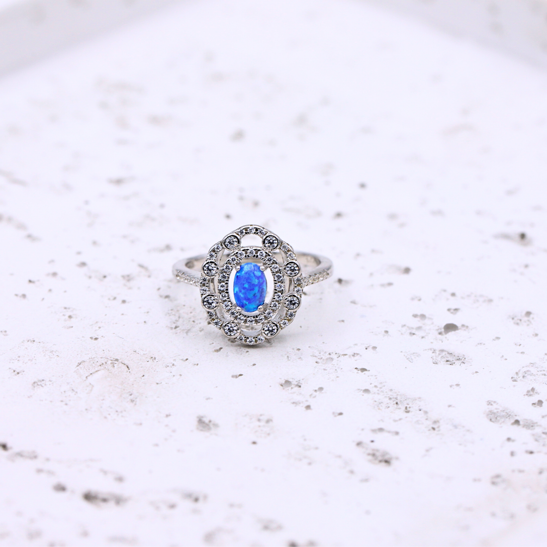 Double Halo Blue Oval Ring