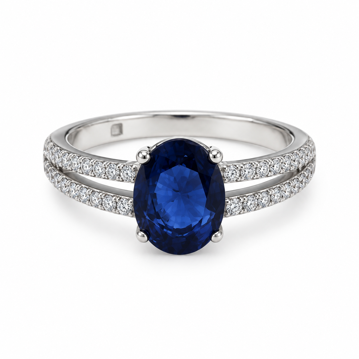 Side view of blue oval CZ ring with split pavé silver band
