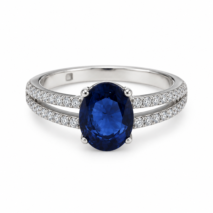 Side view of blue oval CZ ring with split pavé silver band
