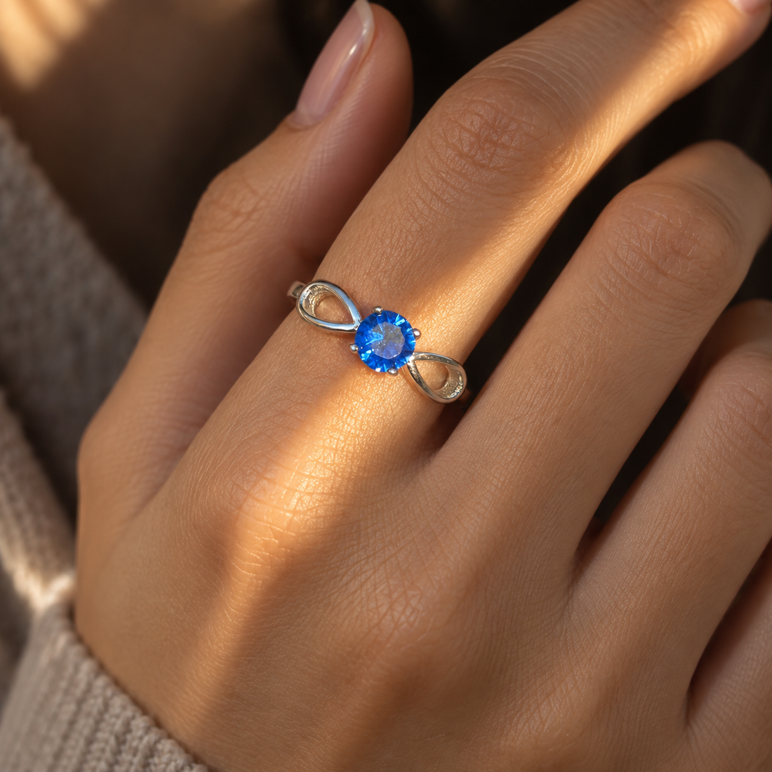 Round Blue Stone Infinity Ring – 925 Sterling Silver