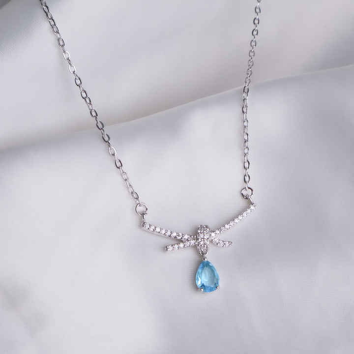 Aquamarine Droplet Bow Necklace - 925 Sterling Silver Pavé Ribbon Pendant
