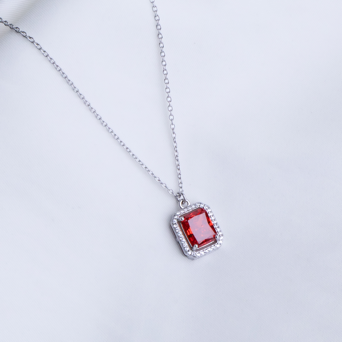 Scarlet Radiance Emerald-Cut Halo Necklace in 925 Sterling Silver