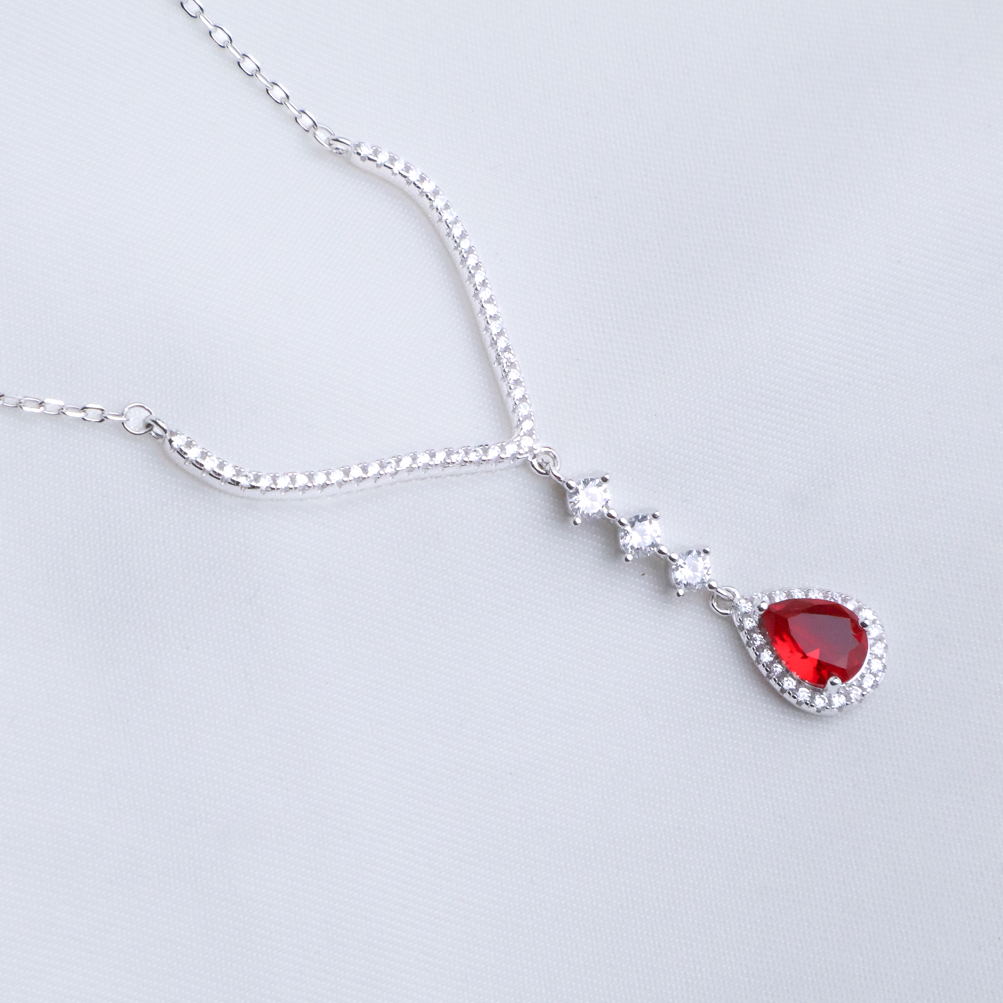 Ruby Red Teardrop Zircon Statement Necklace - Elegant Silver V-Shape - Sterling Silver 925