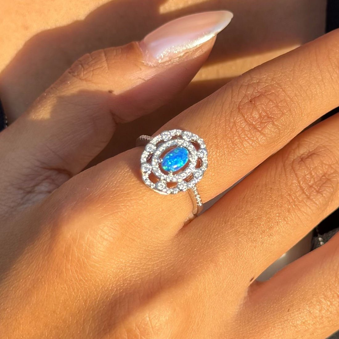 Double Halo Blue Oval Ring
