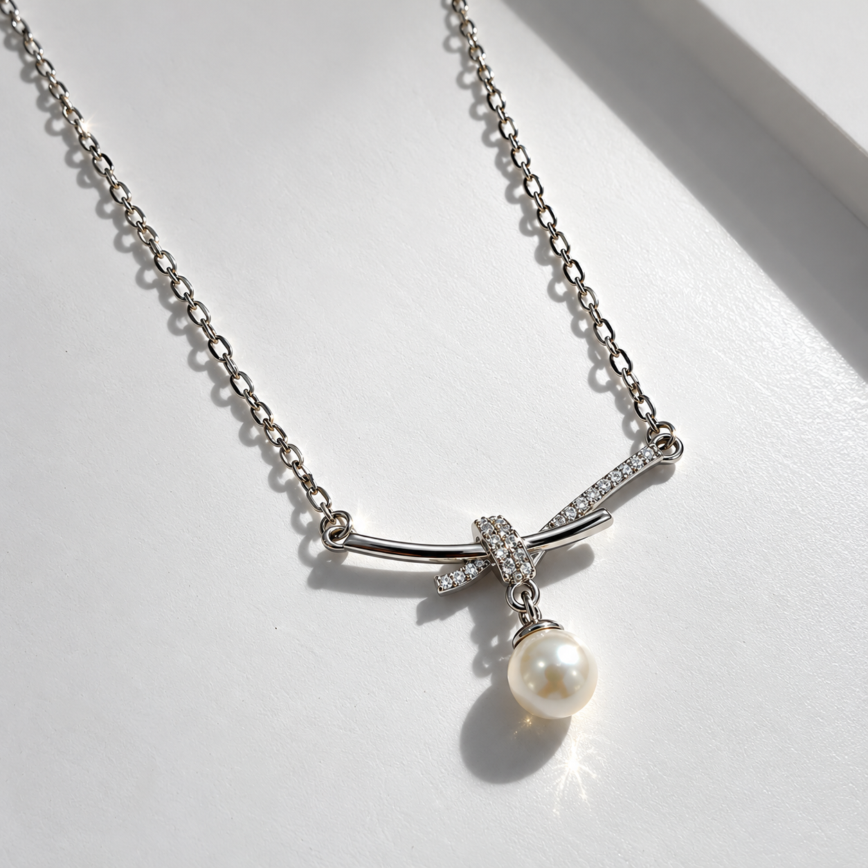 Bow Pendant Necklace with Pearl Drop