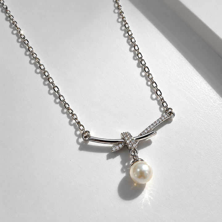 Bow Pendant Necklace with Pearl Drop