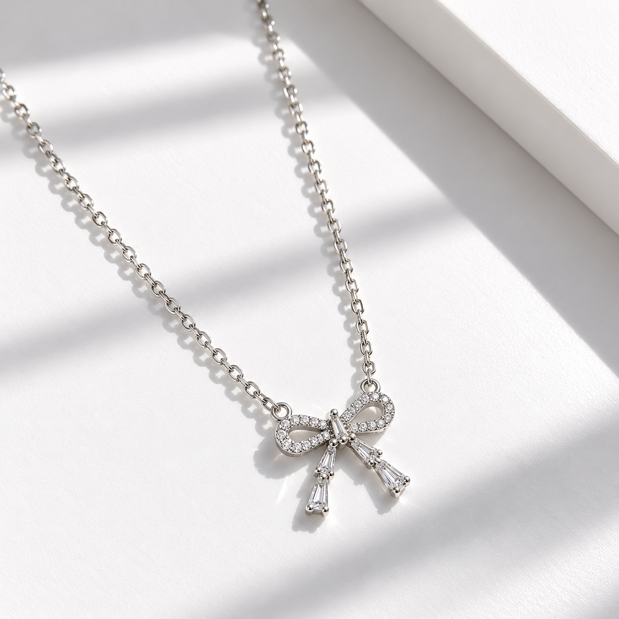 Crystal Bow Pendant Necklace with Sparkling Stone Details